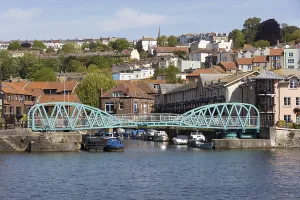 Bristol Cityscape Photography Prints: BRISTOL, UK - MAY 14 : Light blue pedestrian bridge across the River Avon in Bristol on May 14