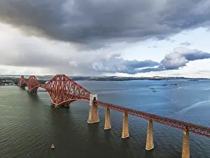 Forth Bridge Scotland Prints: Rain clouds over Forth Bridge from a drone