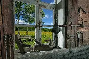 German Countryside View Prints: Rustic workshop with old tools and view out of the window into the landscape