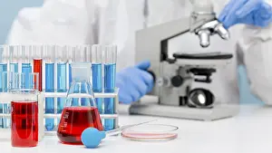 Medical Research And Development Prints: Scientist checking substance with microscope