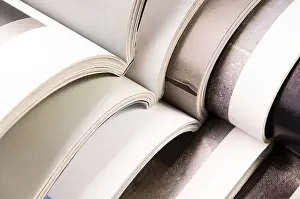 Waste Separation Techniques Prints: Stack of open magazines