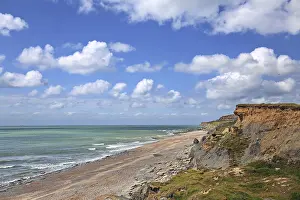 Sandy Beach France Prints: Steep cliffs and sandy beach with dramatic clouds in Ambleteuse