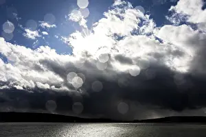 Framed Print : Sun Rays Break Through Clouds Print