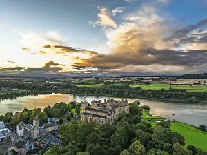 Prints of Sunset over Linlithgow Palace from a drone, Linlithgow Loch, West Lothian, Scotland, United Kingdom Lake Prints: Linlithgow Palace Drone Print, Scotland