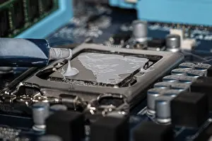 Electronic Components Prints: Thermal paste is applied to a processor
