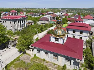 Prints of Urban landscape with architectural complexes and a distinctive golden dome, aerial view, Soroca, district with imposing villas of the Roma minority, gypsy quarter, Gypsy capital of Moldova Moldova Prints: Urban Landscape Print, Soroca, Moldova
