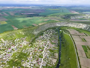 Prints of Village and agricultural fields surrounded by hills and a river in a green landscape, aerial view, loop of the Răut, Raut, view of Trebujeni, Old Orhei, Orheiul Vechi, archaeological site Moldova Prints: Aerial View Print of Orheiul Vechi, Republic of Moldova