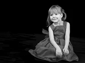 Studio Portrait Photography Prints: Young model posing on black background