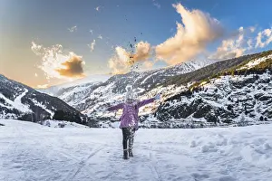 Prints of Young skier, girl having fun on the snow, throwing snow powder up. Winter ski holidays in Andorra, El Tarter, Pyrenees Mountains, Grandvalira Andorra Prints: Young Skier in El Tarter, Andorra - Print