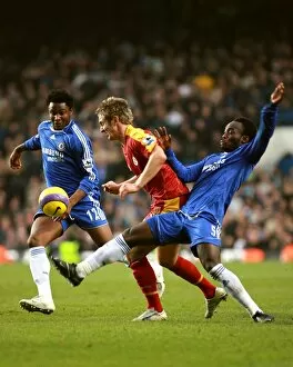 Images Dated 27th December 2006: Chelseas Michael Essien and Mikel put the squeeze on Kevin Doyle