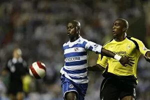 Images Dated 15th September 2006: Leroy Lita holds off Sylvain Distin