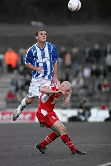 Images Dated 4th December 2006: Joel Lynch challenges in the air