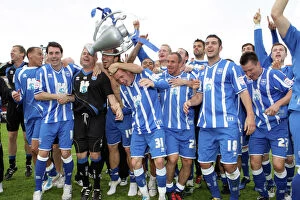 Images Dated 16th April 2011: The players celebrate winning the League 1 title away at Walsall, April 2011